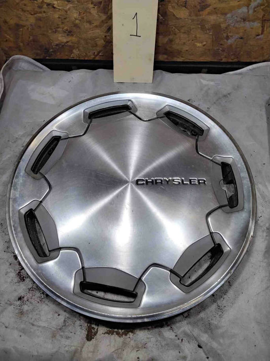 Wheel Cover CHRYSLER LEBARON 85 86